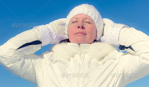 the woman of average years in a white knitted cap (Misc) Photo Download