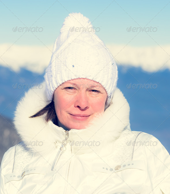 the woman of average years in a white knitted cap (Misc) Photo Download