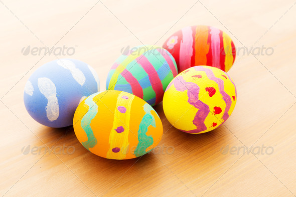 Colourful easter egg on wooden table (Misc) Photo Download