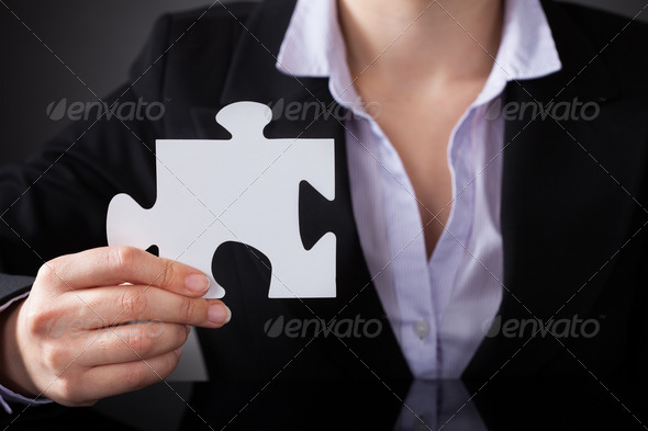 Businessperson With Puzzle (Misc) Photo Download