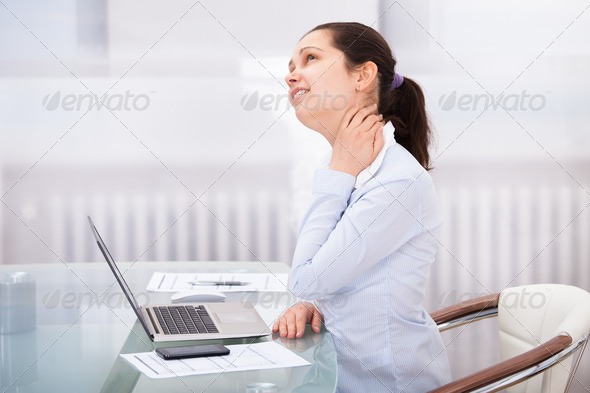 Businesswoman Having Neckache (Misc) Photo Download