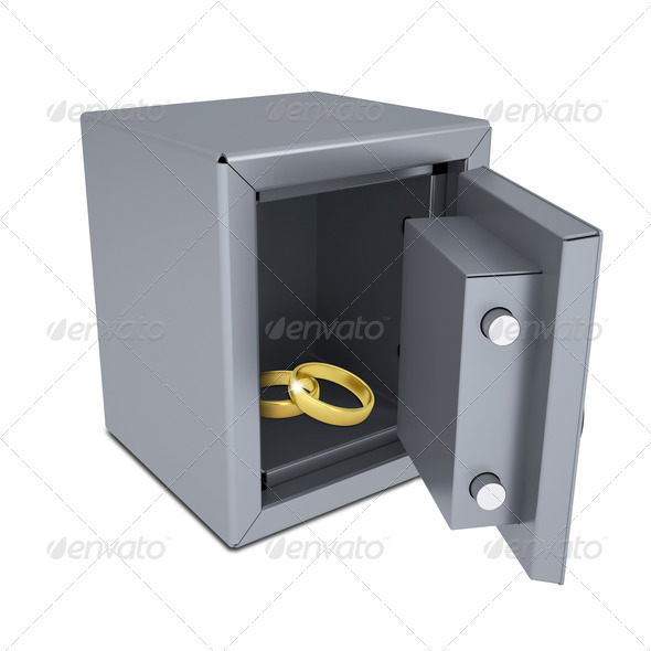 Two gold rings in an open safe (Misc) Photo Download