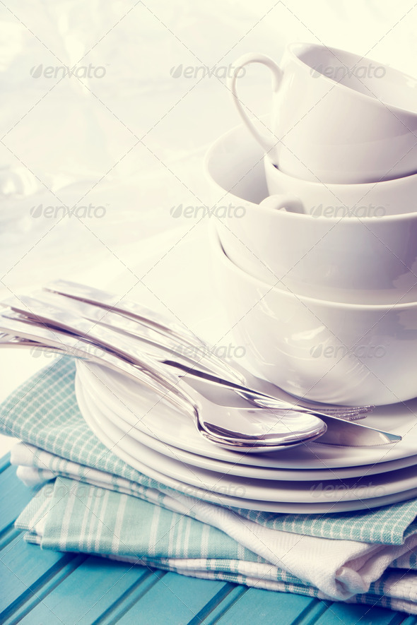 White plates and cups on blue napkins (Misc) Photo Download